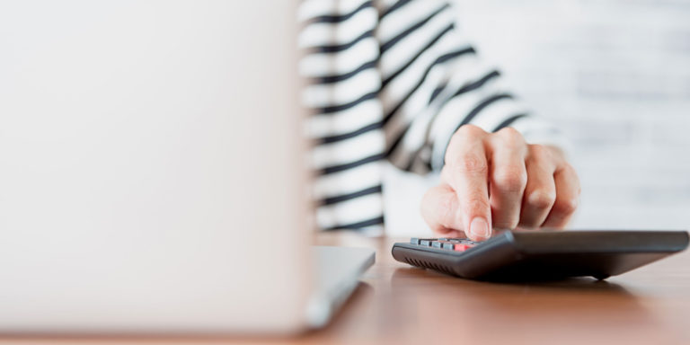 patient calculating the cost of dental procedure