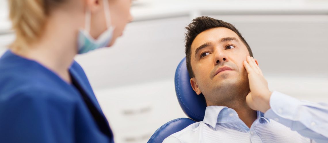 dental patient with tooth pain